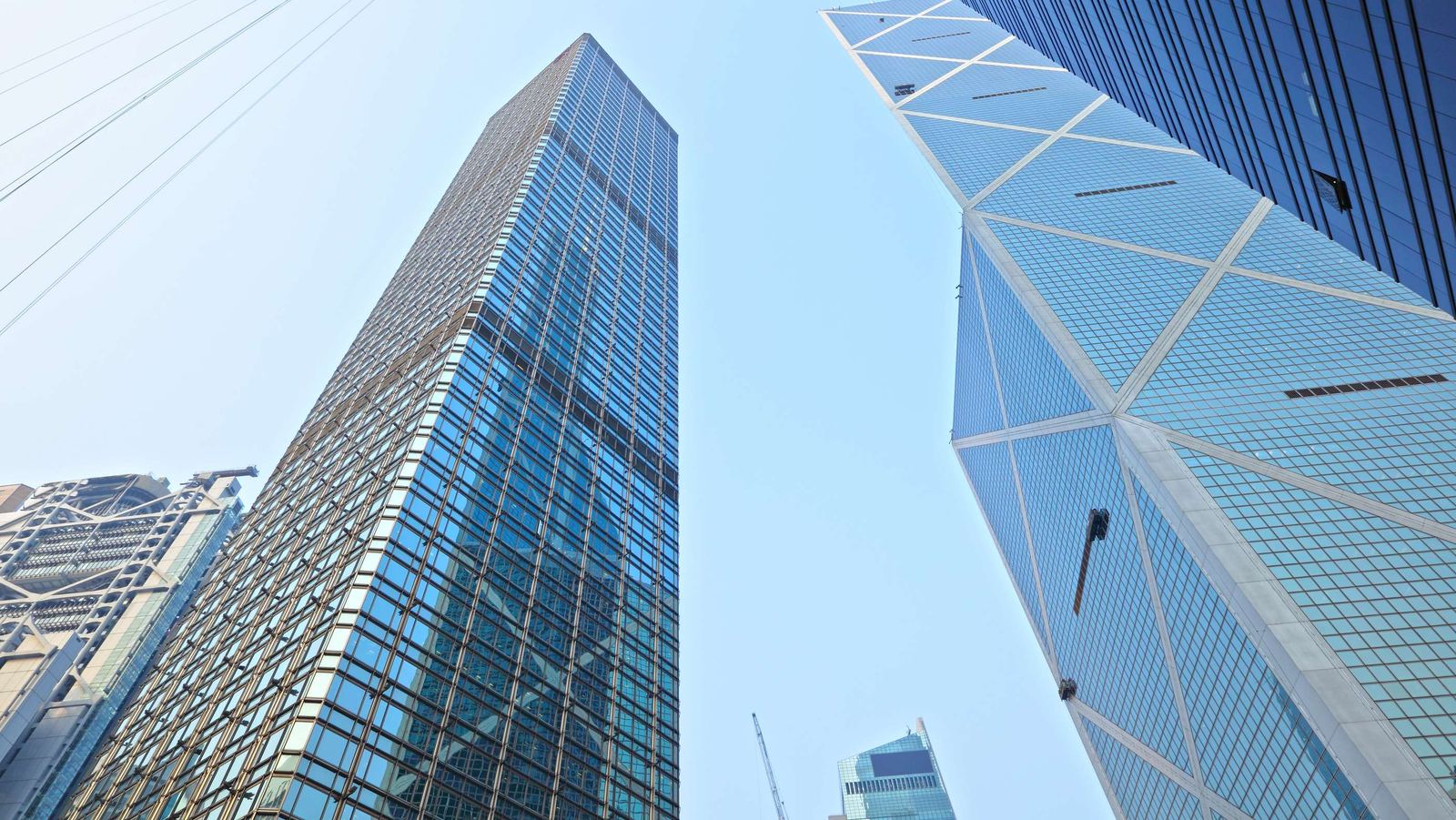 Glass office towers seen from below