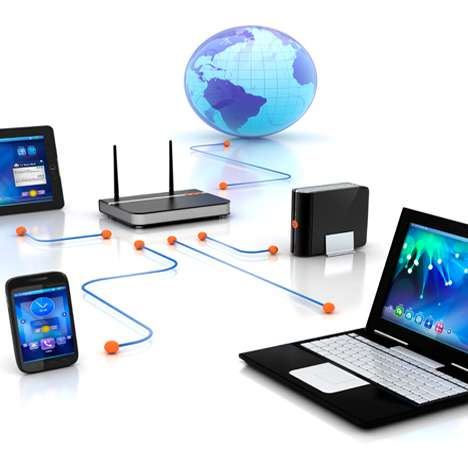 Router connecting a laptop, phones and tablet to the internet